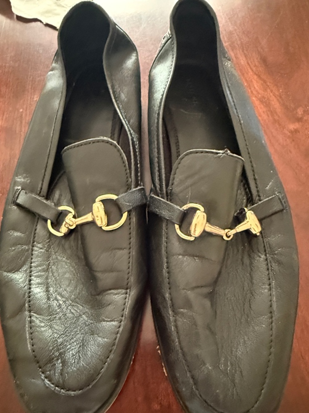 Reserved Black Leather Loafers with Gold Hardware